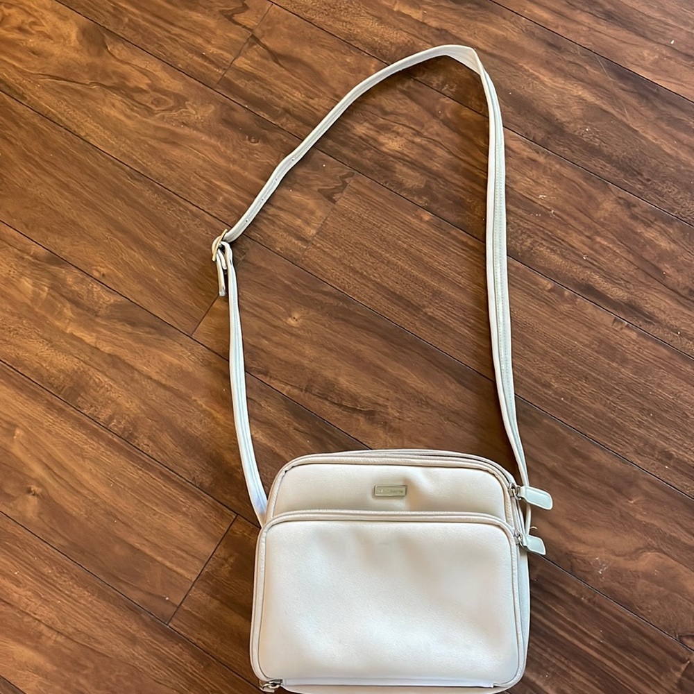Liz Claiborne Crossbody Almond color bag. Great running errands. Cute. Clean.